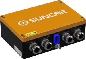 produkt-dc-ladeschnittstelle-hvdu-interflow300-g-cropped-suncar-ag Orange SUNCAR power converter with multiple DC input/output ports and blue switch on the front panel, warning label visible on top edge using screw mounts at corners